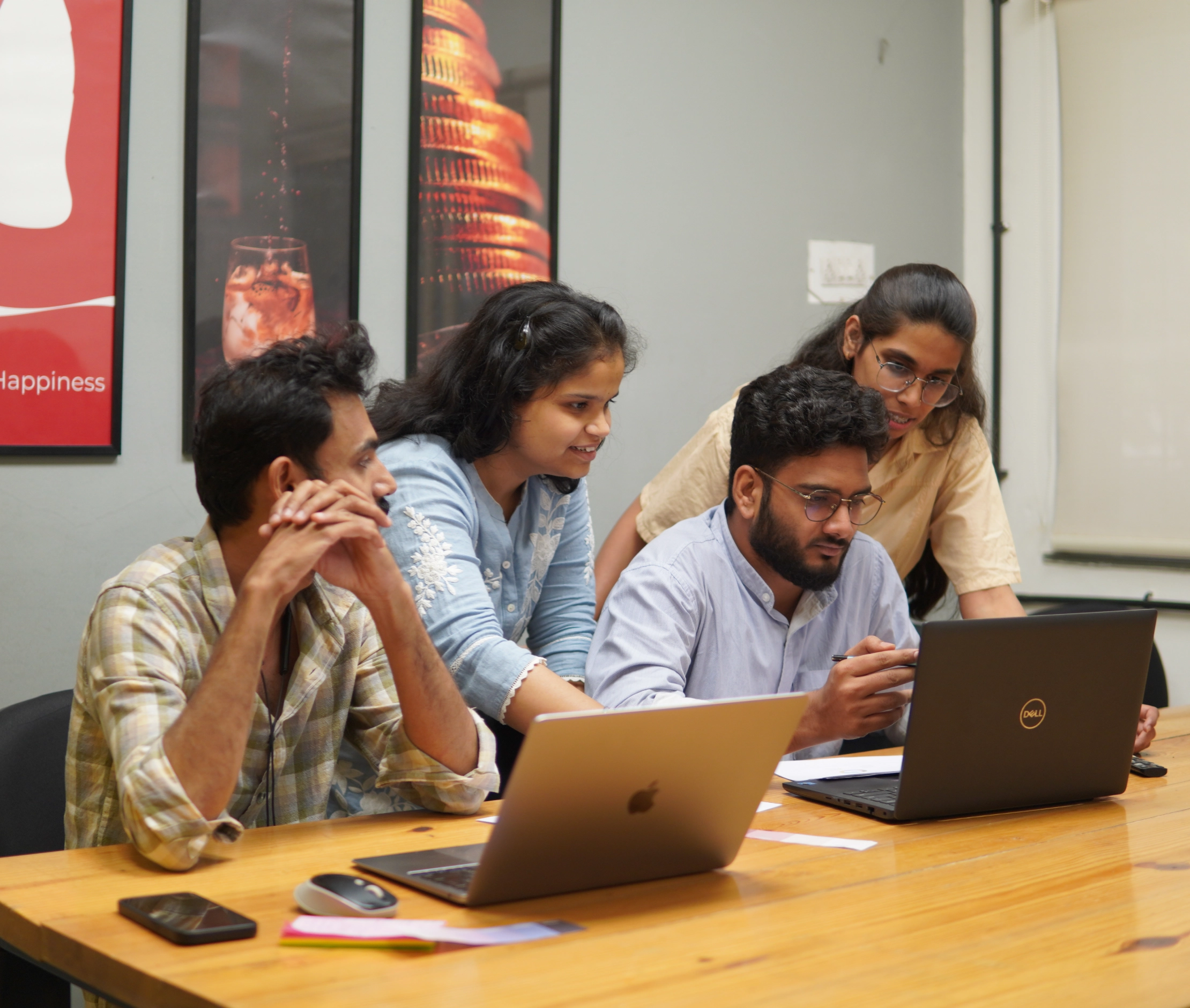 Advolve team collaborating in the workspace